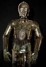 C-3PO from Return of the Jedi, standing with arms at its sides